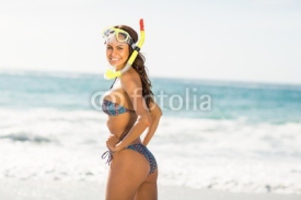 Naklejki Woman wearing a snorkeling equipment