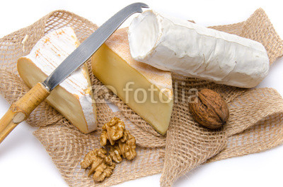Composition of cheeses on a burlap