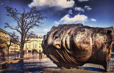sculpture head in Cracow / Krakow in Poland , Europe