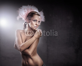 Fototapety Studio shot of a young, beautiful brunette, fashionable woman