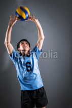 Naklejki Asian volleyball athlete in action