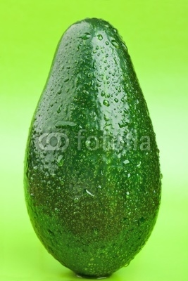 Ripe avocado with drops of water