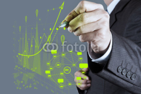 Fototapety businessman hand working with new modern computer and business s