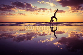 Fototapety woman practicing yoga