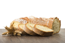 Naklejki Homemade bread sliced close up on white