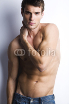 Naklejki Handsome muscular guy with naked torso