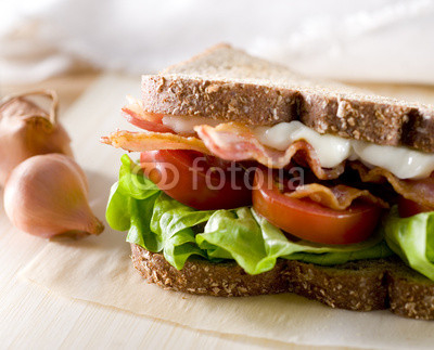 Closeup of bacon, lettuce and tomato sandwich.