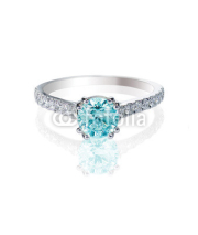 Fototapety Blue Diamond engagment wedding ring colored diamond stone isolated on white