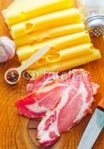 Fototapety Bacon with cheese on the wooden board