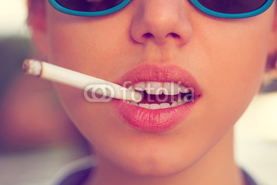 woman smoke a cigarette