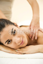 Naklejki Young woman having a massage