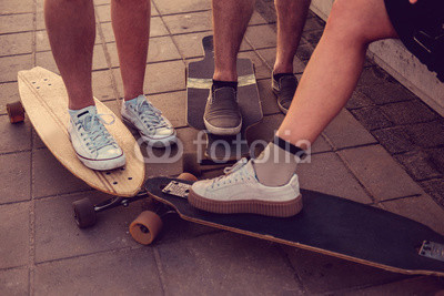 Skaters legs on Longboards.