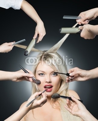 Portrait beautiful white hair girl with makeup brushes near attr
