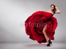 Fototapety Beautiful young lady wearing red rose dress