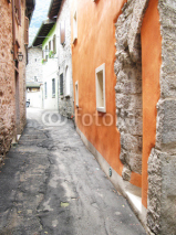Fototapety Narrow street of Cannobio. Italy