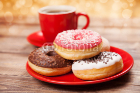 Obrazy i plakaty Tasty donut with a cup of coffee