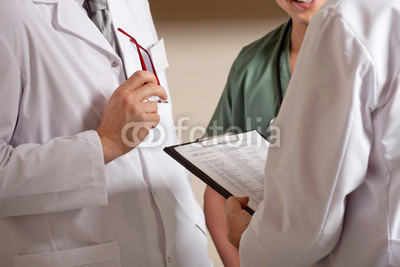 Doctor Holding Clipboard