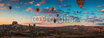 Sunrise and flying hot air balloons over the valley Cappadocia, Turkey.