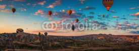 Fototapety Sunrise and flying hot air balloons over the valley Cappadocia, Turkey.