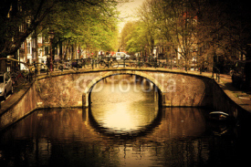 Obrazy i plakaty Amsterdam. Romantic bridge over canal.