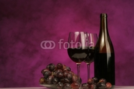 horizontal of wine bottle with glasses and grapes
