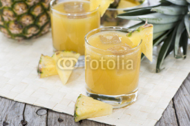 Naklejki Portion of fresh Pineapple Juice