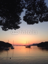 Naklejki sunset with boat 