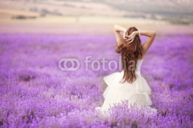 Fototapety Bride in wedding day in lavender field