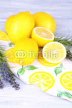 Fototapety Still life with fresh lemons and lavender on light background