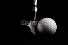 Naklejki golf  club  with ball on black background