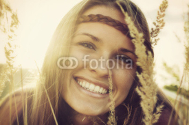 Fototapety Vintage style photo from a beautiful woman in autumn