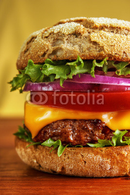Multigrain bun cheese burger , vertical