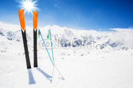 Obrazy i plakaty Skiing , mountains and ski equipments on ski run