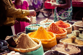 Naklejki Traditional spices and dry fruits in local bazaar in India.