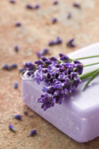 Naklejki Violet soap with fresh lavender flowers