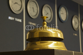 Fototapety old hotel bell with watch in background