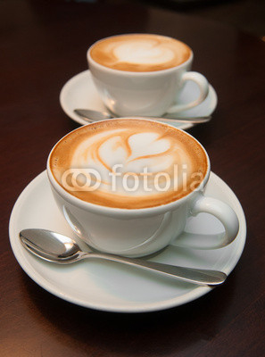 two cappuccino cups