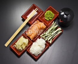 Fototapety Ingredients for sushi: sliced salmon cucumber rice 
