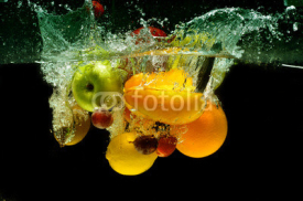 Fototapety Fruit and vegetables splash into water