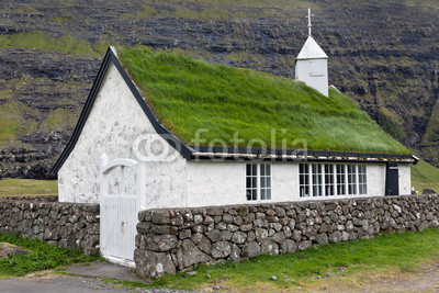 White church with turf roof