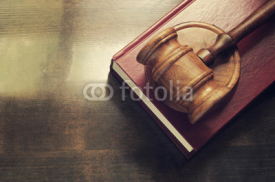 Fototapety Gavel and legal book on wooden table
