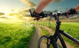 Fototapety Man with bicycle riding country road