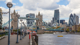 Obrazy i plakaty LONDON, UK - APRIL 30, 2015: Tower bridge and City of London financial aria on the background. View includes Gherkin and other buildings