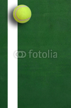 Naklejki Tennis ball on court grass play game background sport for design