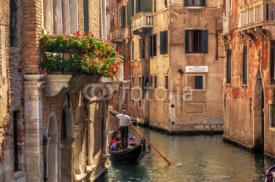 Naklejki Venice, Italy. Gondola on a romantic canal.  