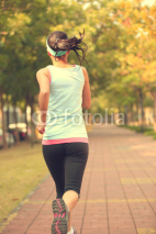 Obrazy i plakaty Runner athlete running on road