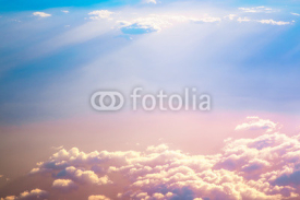 Fototapety Sunrise above clouds