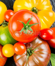 Naklejki Many varieties of colorful tomatos