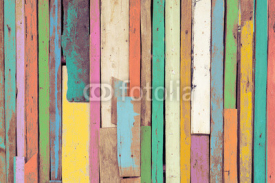 The colorful artwork painted on wood material for vintage wallpaper background.