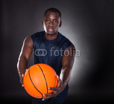 Naklejki African Young Man With Basketball